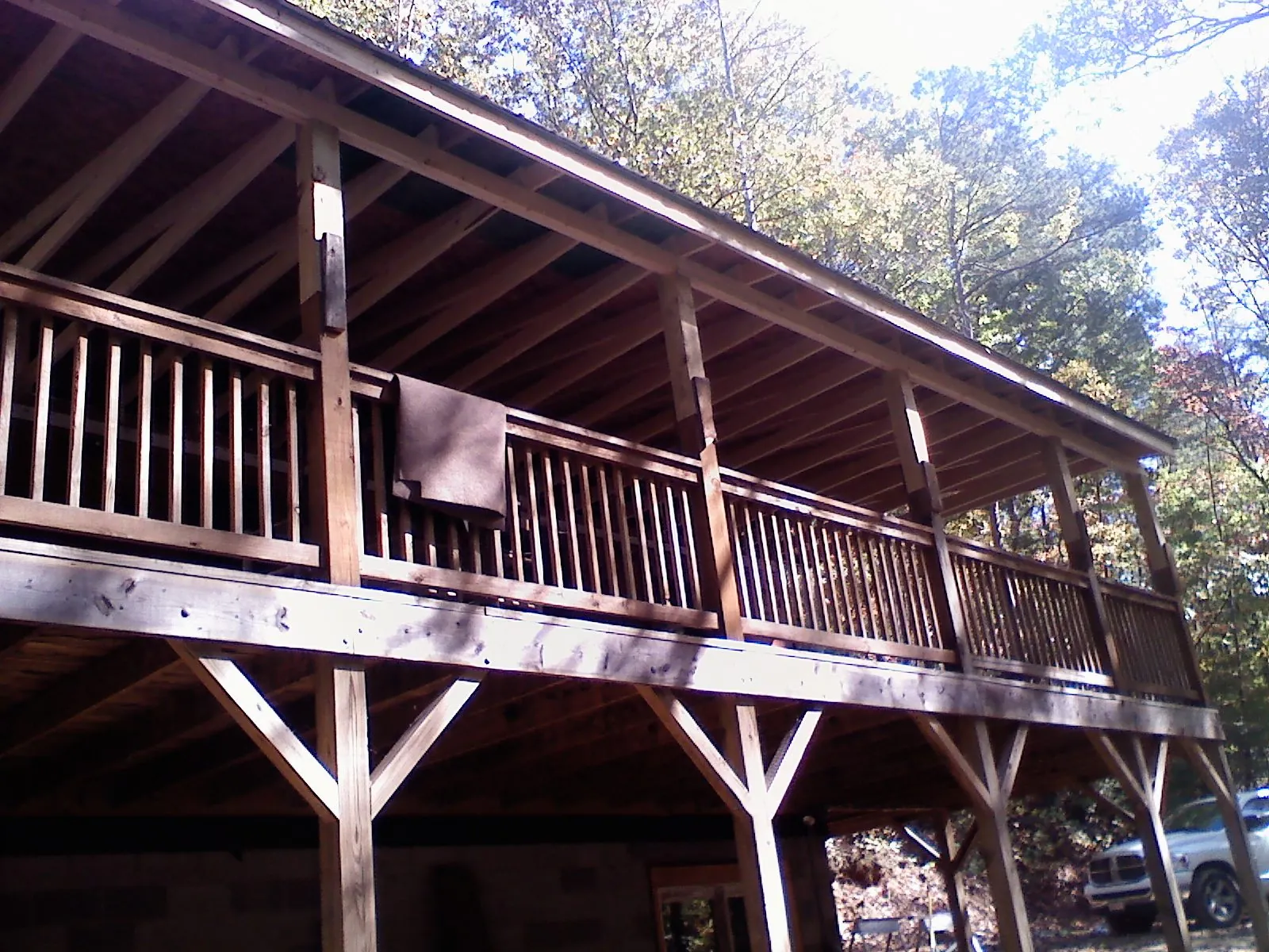 Timber framing under a new elevated porch and deck — Roof Leak Repair in West Orange by Roofing Brothers
